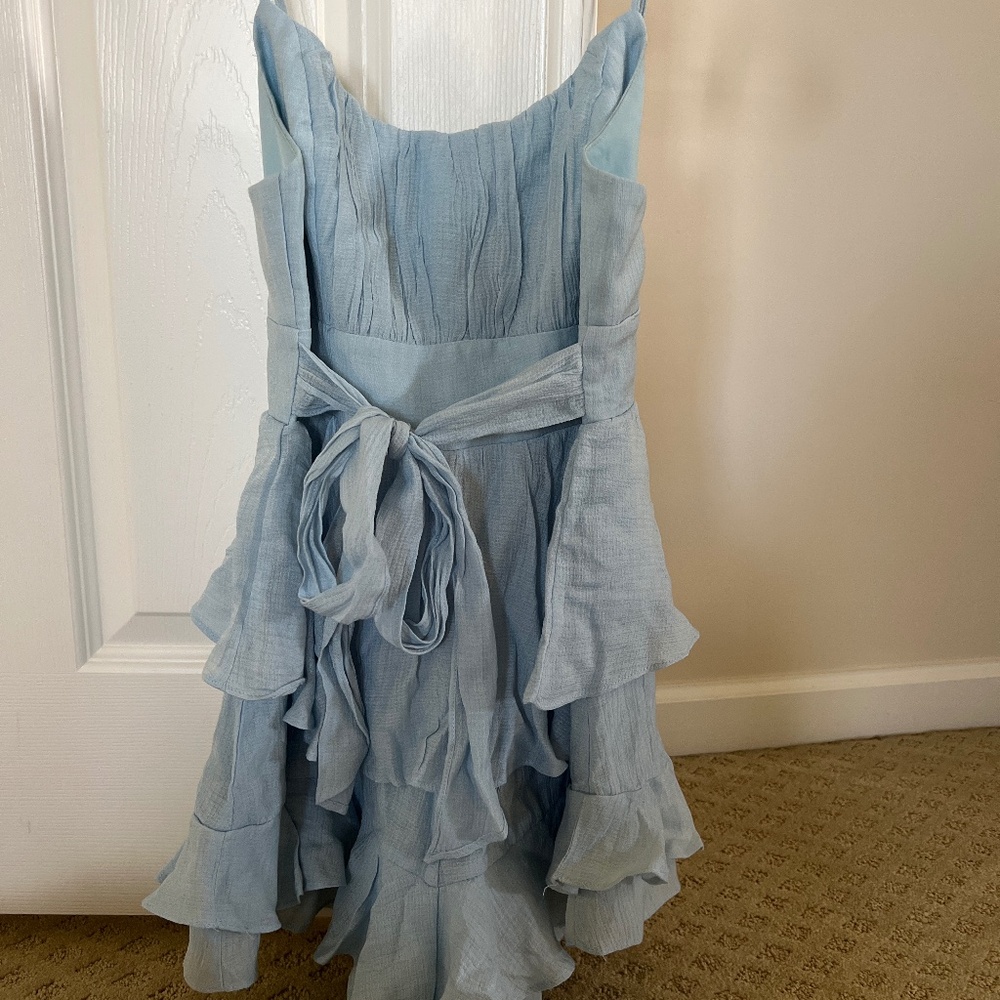 Baby blue romper gauze material. Very elegant.